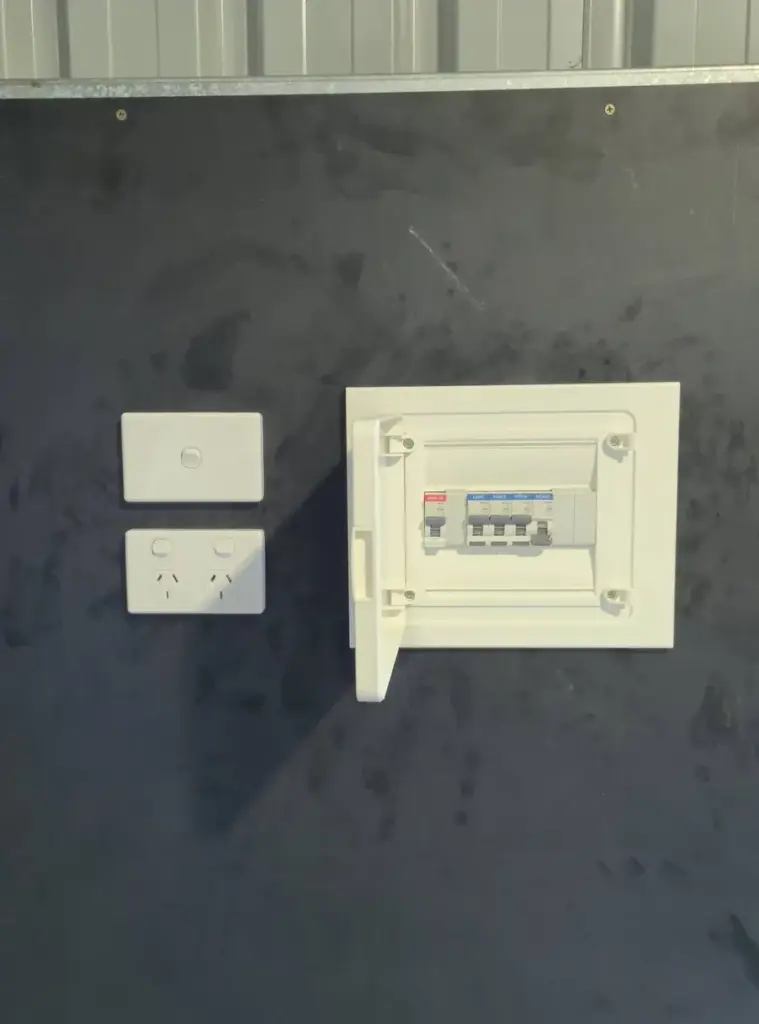 New sub-board with circuit breakers and a double power point on a shed wall